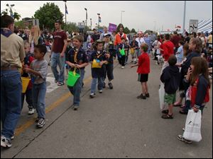 CTY oregfest22p 2 .jpg  Despite threatening skies and rain hundres of people lined Dustin road for the grand parade during the Oregon Festival in Oregon, OH 05/22/2005 The Blade/Lisa Dutton