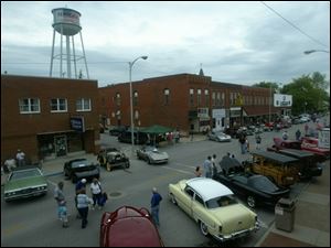 NBR pember02p 02 --  Cars line Front St during the first of four Cruisin' Nites of the summer in Pemberville, which is host to the car show the first Thursday of every month, takes place on Thursday, June 2. More than 125 cars were on display at this months night. The Blade/Alyssa Schukar