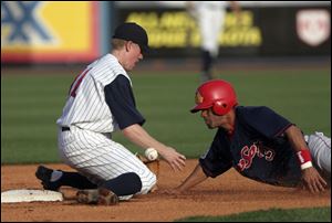 Mud Hens second baseman Kevin Hooper is charged with an error in the second inning as Pawtucket s Luis Figueroa is safe.

