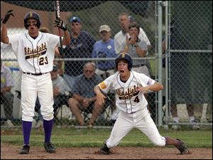 Blissfield's Ryann Eff, left, and Andrew Estes tell teammate Justin Wilson (not shown) to slide.