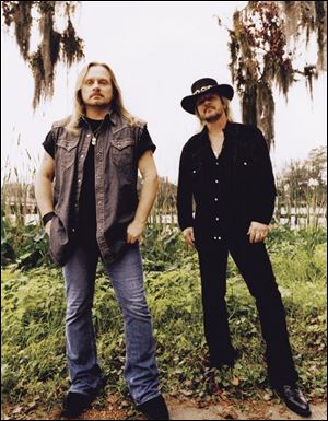 Johnny Van Zant, left, and brother Donnie.