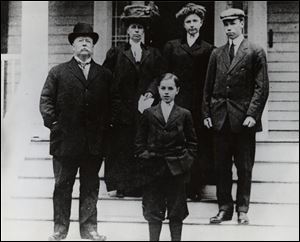 Governor Taft's great-grandfather, former President William Howard Taft, left, and his grandfather, future Sen. Robert A. Taft, right, are captured in a 1918 photo of the family.