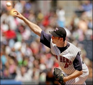 Mud Hens pitcher John Ennis makes a delivery against Scranton yesterday at Fifth Third Field. Ennis pitched two inning, giving up two hits and two earned runs, but struck out three batters. 