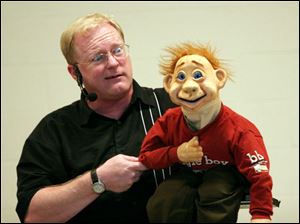 NBR hemm26p   Mike Hemmelgarn and his friend Spud at the celebration of the Pemberville Public Library's summer reading program with over 100 children on July 26, 2005 in Pemberville, Ohio. Hemmelgarn is a comedy juggler and ventriloquist from Springboro, Ohio. The Blade/Jetta Fraser