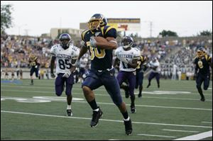 Senior cornerback Antonio Malone returned an interception 60 yards for Toledo's first touchdown of the season - and the first of many UT scored last night.