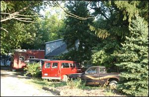 Huron County deputies found 11 children locked in cages in this Clarksfield Township home.
