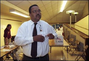 Mayor Jack Ford, shown after casting his ballot Tuesday, must
show  sharp contrasts  with his opponent, advisers say.
