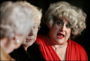 Ursula (Carol Ann Erford), right, tells Mae (Madge Levinson),
left, and Lillian (Joanne Toth) how she would run things.