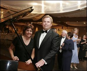 SWEET MUSIC: Kim and Bob LaClair form an elegant duo at the 45th Sapphire Ball to benefit the Toledo Opera.
