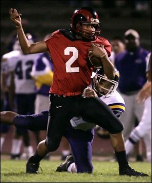 Ronney Hester ran for 60 yards and three TDs and completed 13 of 19 passes for 182 yards and another TD as Rogers' offense came alive.