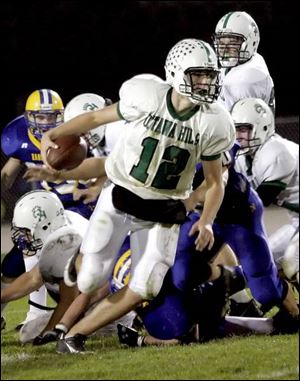 Ottawa Hills QB Sam Miller not only eluded Northwood tacklers, he was able to throw two touchdown passes in the final minutes of the first half to cement the pivotal TAAC victory.