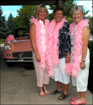 FAIREST OF THE FAIRWAY: The feathers of, from left, Pam Hill, Mary Jo Sherman, and Kay Ingle are unruffled during a day of golf at the Stone Oak Country Club.