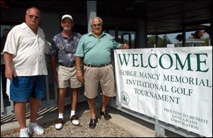 FORE GEORGE: From left, Brian Gump, Tim Corcoran, and John Mancy prepare to play golf in memory of Mr. Mancy's brother, George, at Whiteford Valley.