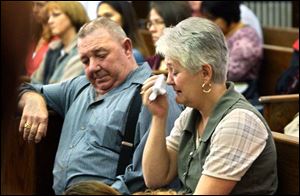 Dale and Debra Stover, Connre Dixon's grandparents, weep during Paul Efaw's sentencing.