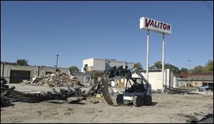 Land where Valiton Motors is being torn down to make room for a restaurant went for
$600,000 an acre, less than some other properties closer to Westfi eld Franklin Park mall.