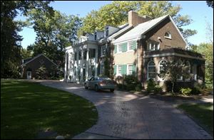 Talk about Katie Holmes and Tom Cruise buying a house in Ottawa
Hills centers on this 23-room mansion on Ridgewood Road.