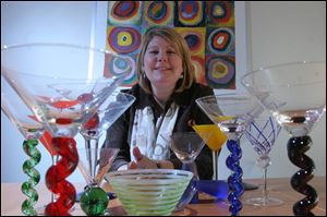 Julie Hartten, owner of Swank, got idea from a downtown display of Libbey Inc. glassware.