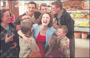 
Evelyn Ryan (Julianne Moore) celebrates with her children.