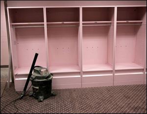 The renovated visitors' locker room at Kinnick Stadium is more pink than when former coach Hayden Fry picked the color.