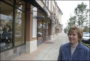 For Christy Burgei, who drives to the center from Napoleon, the variety of retailers is the attraction.