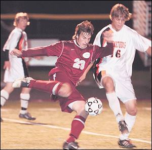 Genoa s Cory Hornyak (23) had two goals and two assists
against Joel Bruskotter and Fort Jennings last night.
