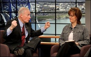 Carty Finkbeiner talks to Allison Perz during a taping of  Carty & Co.  at WTVG-TV, Channel 13. The public affairs show aired Sunday mornings. Mayor Jack Ford never appeared on the show.
