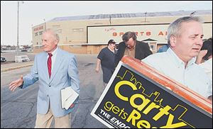 Mayoral candidate Carty Finkbeiner told reporters and his supporters that an arena could be finished in two years.
