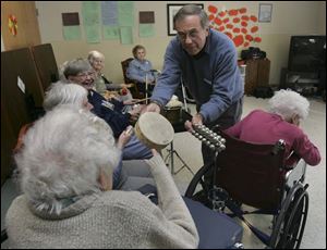 David Rogers, a former music professor at Bowling Green State University, shares music at Harborside in Swanton.
