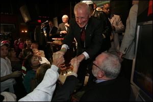 A victorious Carty Finkbeiner accepts congratulations from well-wishers.