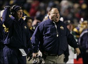 Toledo coach Tom Amstutz, right, was not happy about the Rockets' first loss to Northern Illinois in 12 games.