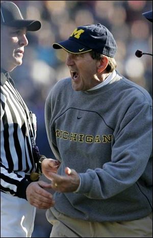 Michigan coach Lloyd Carr is furious over a delay of game penalty. He thought he had called time out.