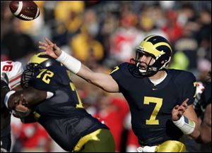 Michigan QB Chad Henne completed 25 of 36 passes for 223 yards, but the numbers he might be remembered for is his record against Ohio State: 0-2.
