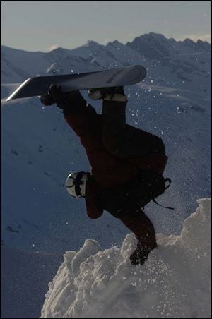 Veteran snowboarder Terje
Haakonsen goes inverted in
First Descent.