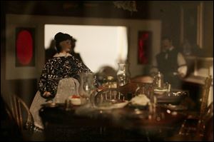 The Columbian House model is furnished to the smallest of details, including this dining scene. The model will be unveiled at the Hancock Historical Museum during tomorrow s open house.

