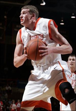 Erik Marschall played four years under his father at New London (Ohio) High School. He is averaging nine points and five rebounds a game for Bowling Green.
