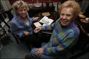 LOTS OF BUNCO: Joey Stamp, left, and Terri Cole have a lot of fun at their monthly Bunco game.