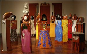 HONORED GUESTS: Guests in 'The Party' are 15 freestanding figures and wall panels.