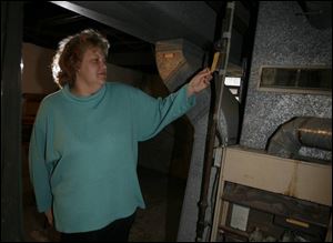 Stacey Meadors says the furnace in her family's home is 40 years old, but they can't afford to replace it. 