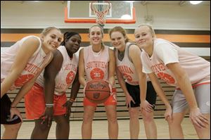 Southview is 13-0 and is aiming for the Northern Lakes League title led by, from left, Mandi Lisk, Bahiyjaui Allen, Liz Tansey, Kelsey Navarre and Morgan Gatwood. The Cougars are ranked No. 2 in Division I in Ohio.
