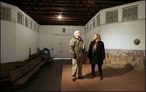 Tom Balduf, a city parks board member, and Michelle Grigore, Bowling Green's parks director, hope to save Needle Hall. 