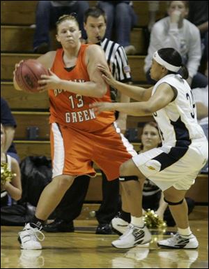 Liz Honegger has collected 1,031 points for the Falcons, even though she's only a junior, and has rejected 134 shots.