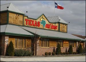 Texas Roadhouse is on Airport Highway, just east of U.S. 23.
