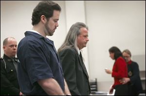 Convicted rapist Neil Newmister, left, with his attorney, Adrian Cimerman, learns his sentencing was postponed.