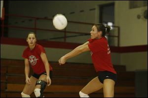 Veronica Rood, right, a four-year starter, has the highest hitting percentage (.405) for the Mules.
