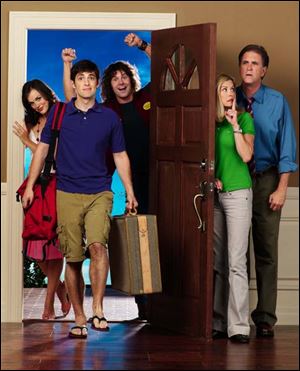 Unsure where his life is headed, Nate (Josh Dean, with suitcase) returns home after college in the partially improvised comedy <i>Free Ride</i>, which also stars, from left, Erin Cahill as Amber, Dave Sheridan as Dove, and Loretta Fox and Allan Havey as Nate's parents. 