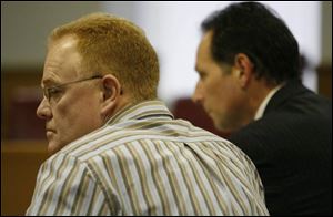 Dean Peverly, left, sits next to his lawyer, Jay Feldstein. A Defiance County judge warned Peverly that the educator will go to jail if he violates the terms of his three-year probation. which includes the stipulation that Peverly cannot hold a position of trust with a school or charity. Peverly took $11,000 from a school fund that he oversaw. 