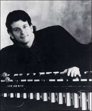 Steve Hobbs decided to give up the drums and focus on the
vibraphone and marimba.