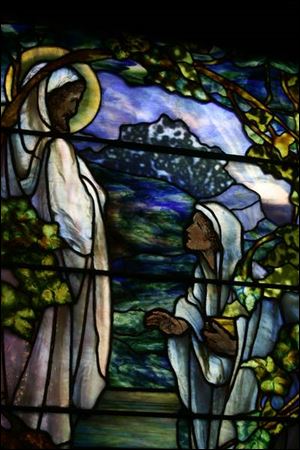 First Congregational Church in Toledo's Old West End has 16 Tiffany stained-glass windows, including this one of Jesus appearing to Mary after his resurrection.
