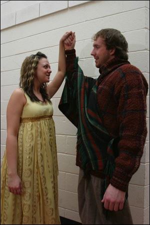 Nikki Soldner plays Elsa and Seth Shaffer portrays Lancelot in
The Dragon, which opens tomorrow at the University of Toledo.