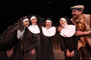 Cast members of the Toledo Repertoire Theatre s production of Meshuggah-Nuns! are, from
left, Amy Scott, Rosemary O Brien, Janna Ravel, Cindy Bilby, and Jeffrey J. Albright.